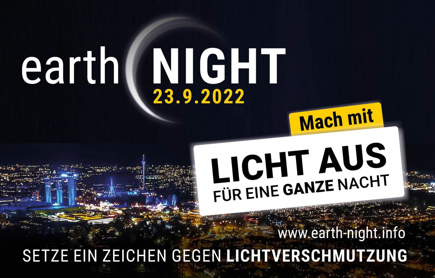 Sujet mit beleuchteter Stadt und dunklem Himmel