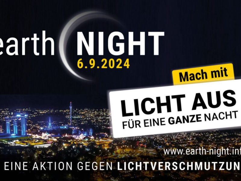 Nachthimmel und Stadtbeleuchtung