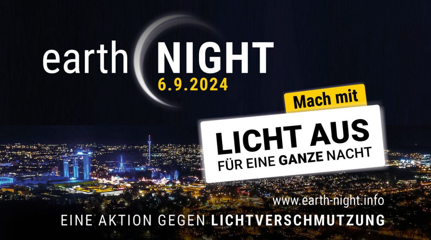 Nachthimmel und Stadtbeleuchtung