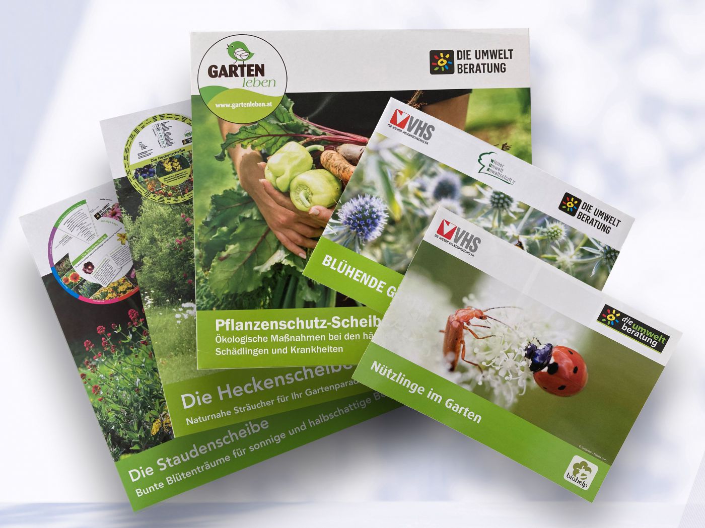 Titelseiten der Poster und Gartenscheiben